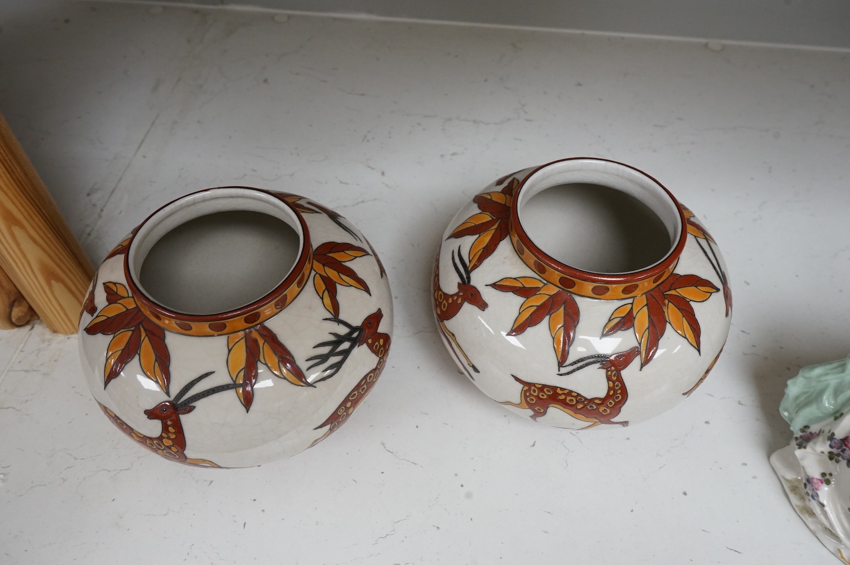 A pair of contemporary Boch Keramis pottery 'leaping deer' vases